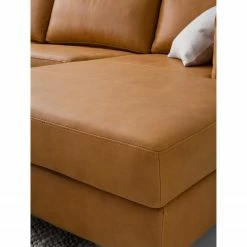 Studio Copenhagen Wohnlandschaft COSO Classic+ - Echtleder Taru: Hellbraun - Longchair davorstehend rechts / Ottomane links - Bettkasten - Chrom glänzend -Wohnzimmermöbel boutique en ligne 1000212033 200923 09530200424 DETAILS P000000001000212033